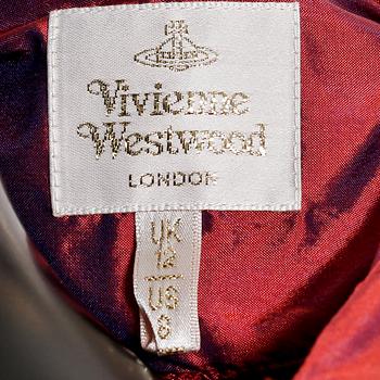 VIVIENNE WESTWOOD, a three-piece ensemble consisting of jacket, top and skirt.