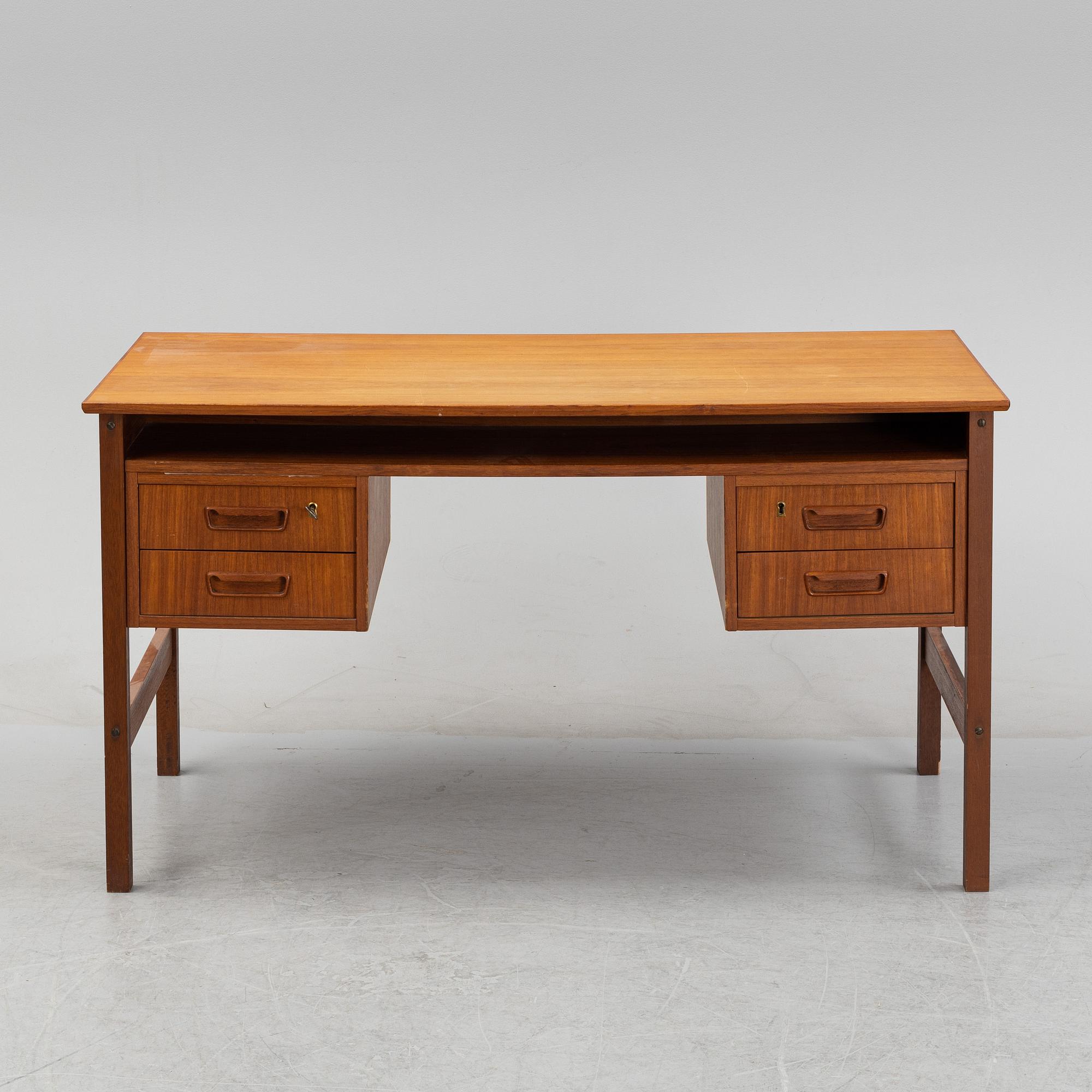 A 1960's teak writing desk.
