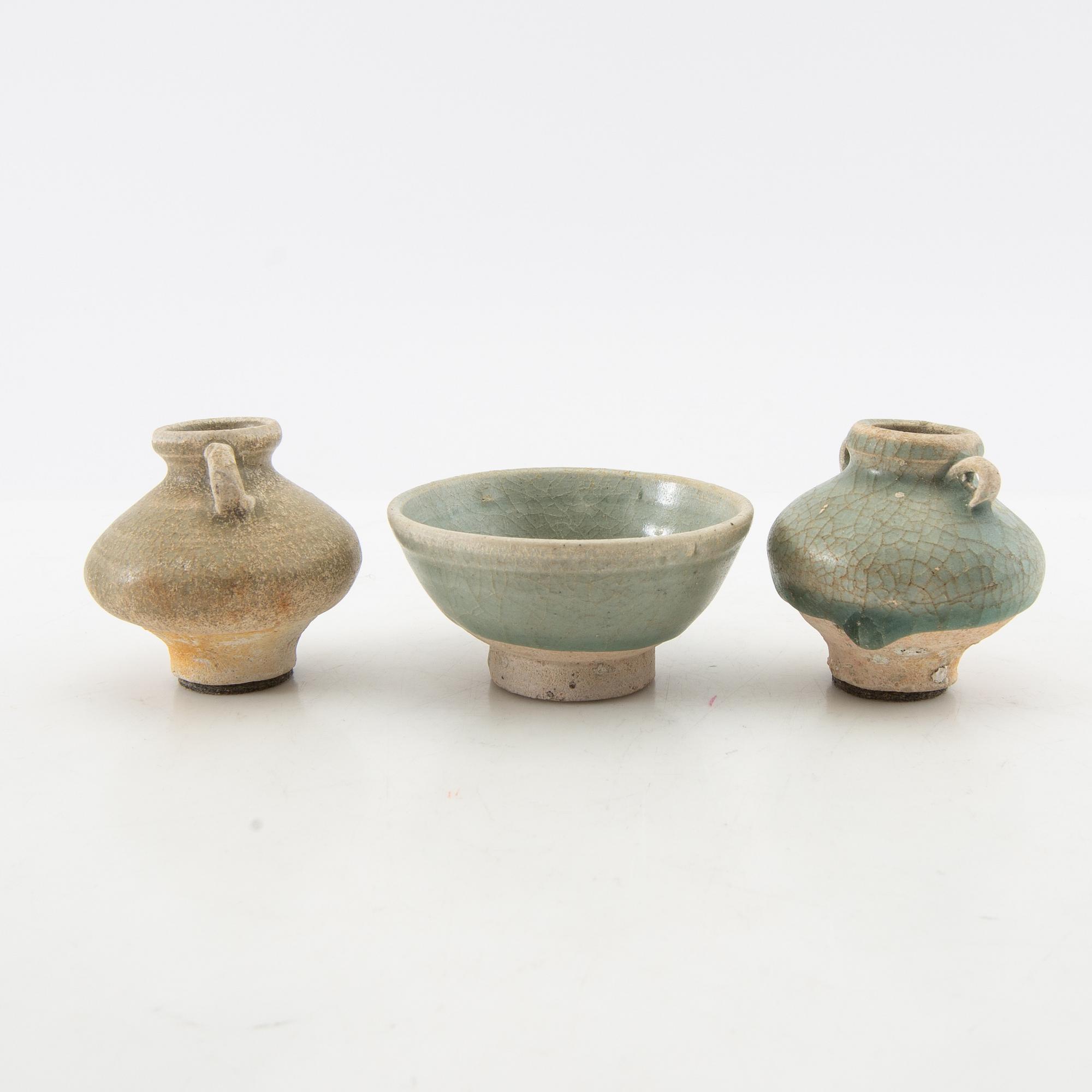 A group of three celadon glazed vessels, Sawankhalok, Thailand, 15th/16th century.