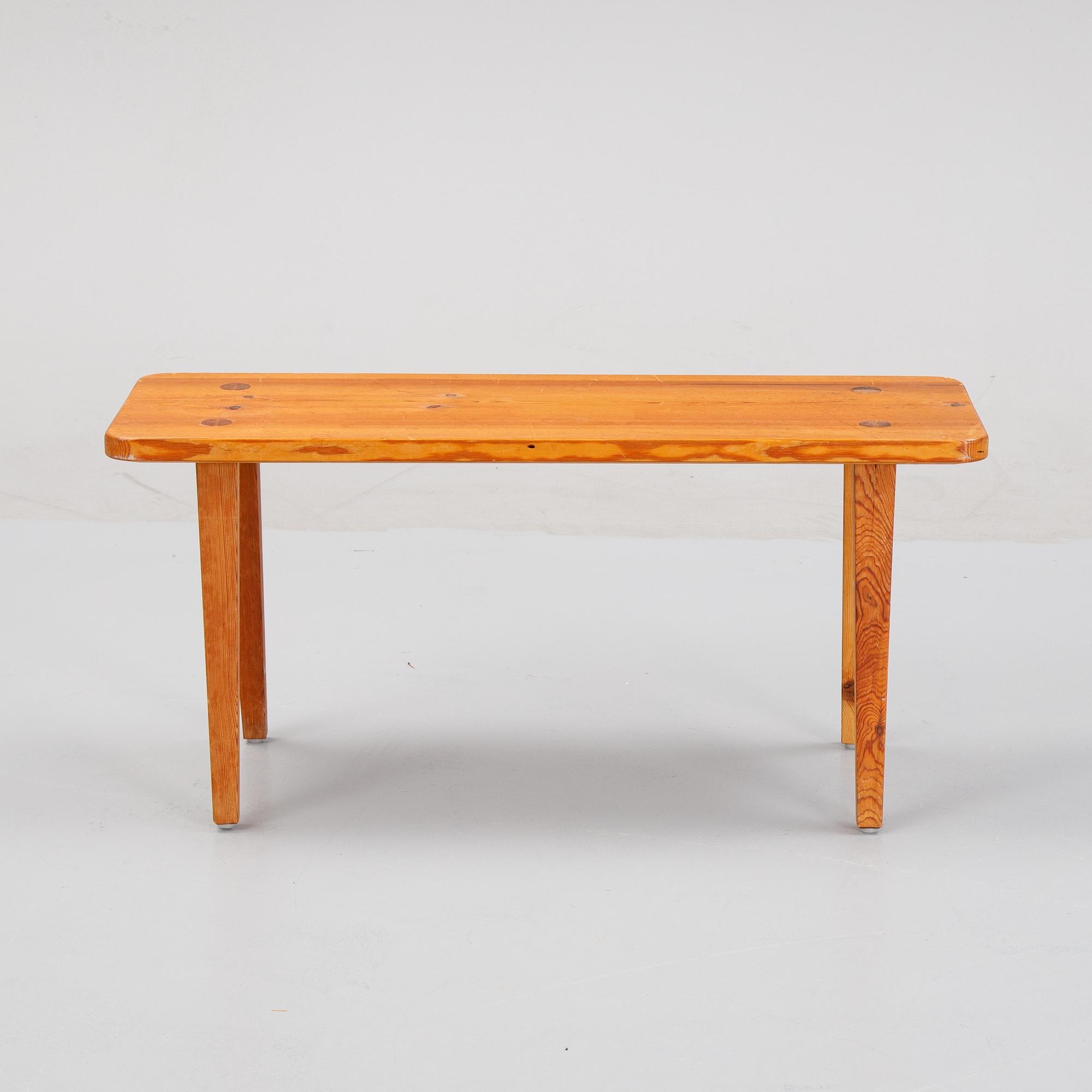 A pinewood stool, second half of the 20th Century.