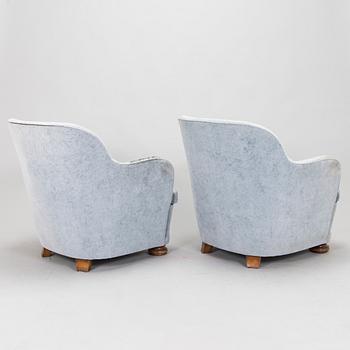 A pair, ofmid-20th century armchairs.