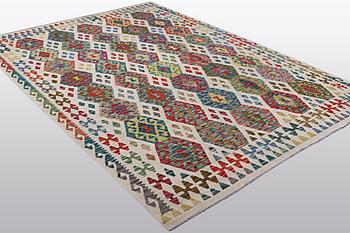 A carpet, kilim, ca 300 x 207 cm.