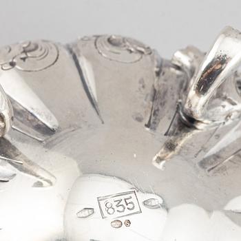 A silver teapot, creamer and sugar bowl, swedish import mark.