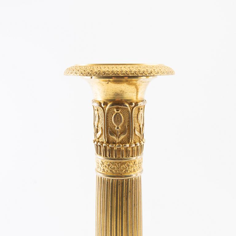 A pair of candlesticks, Empire France first half of the 19th century.