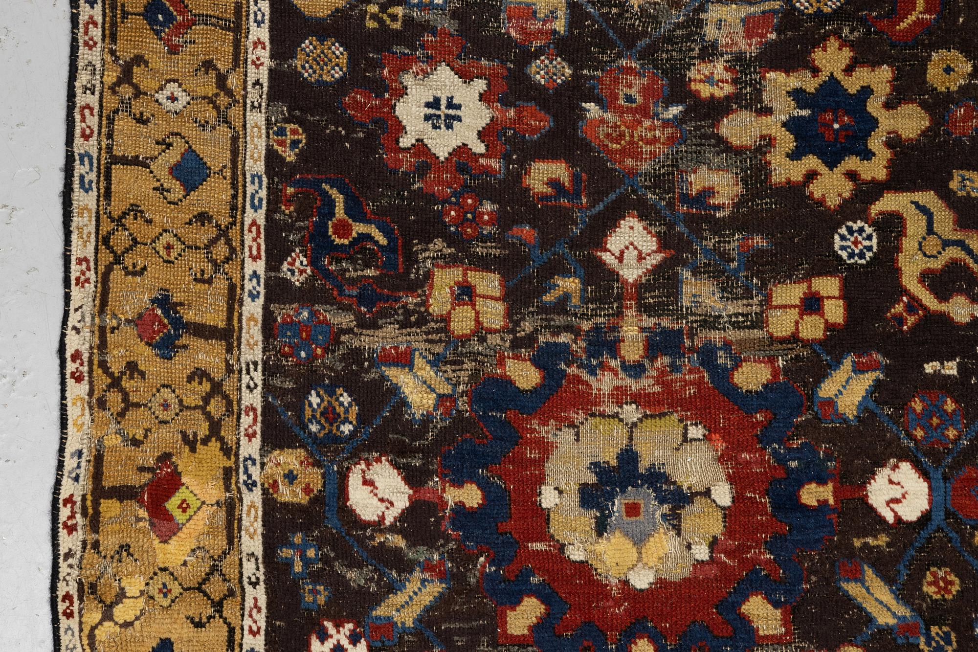A carpet, fragment, an antique Karabagh 18th century, ca 293-300,5 x 202,5-205,5 cm.