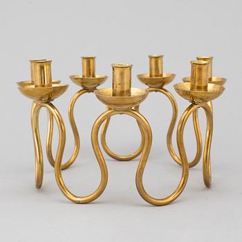 LARS HOLMSTRÖM, a brass candlestick.