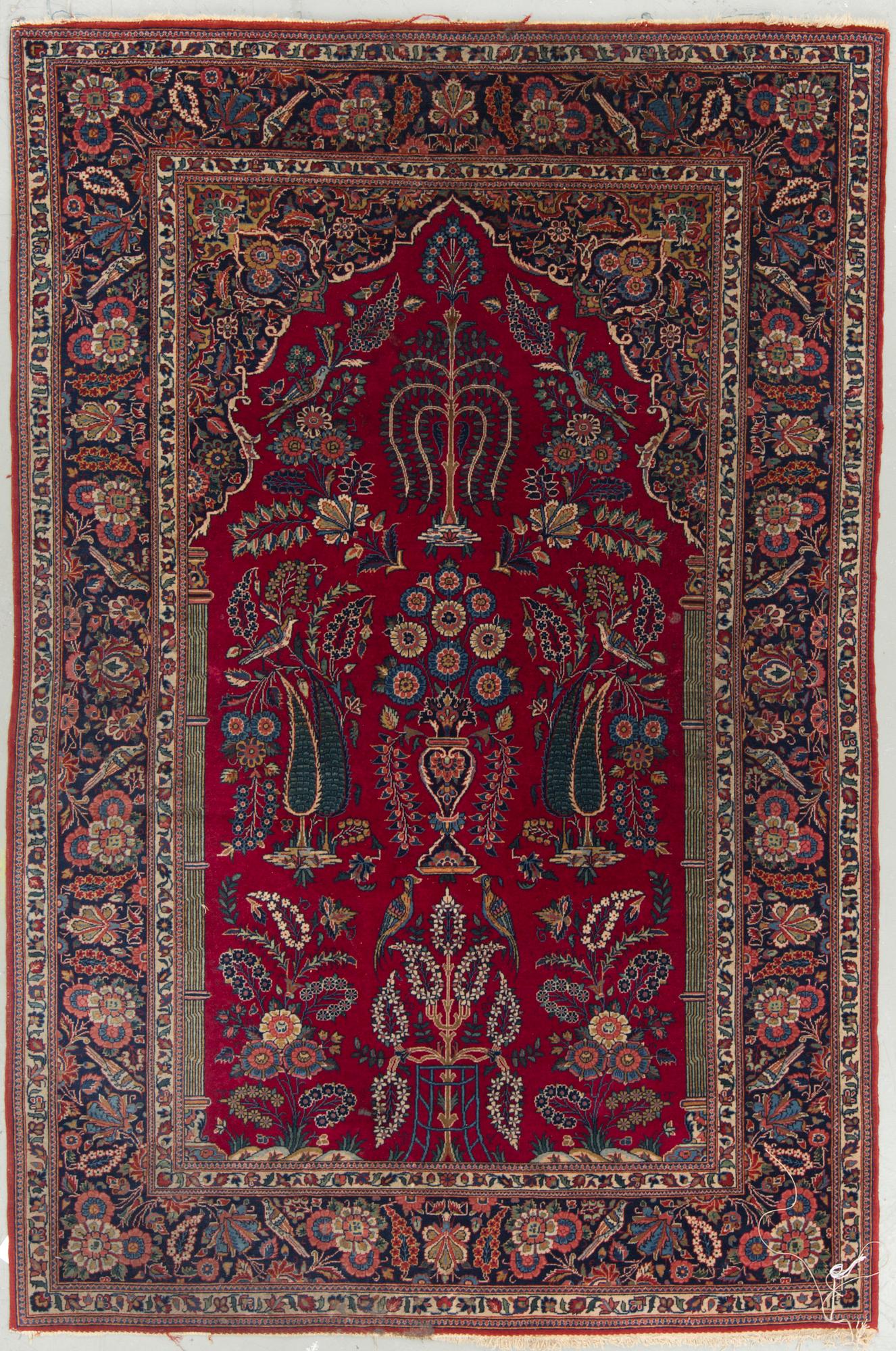 A semi-antique Kashan, around 204 x 136 cm.