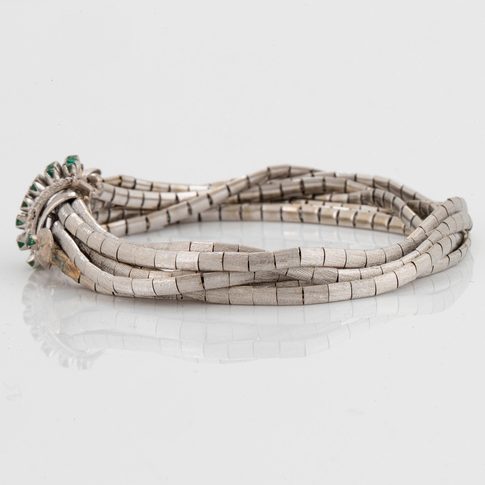 Armband 18K vitguld med fasettslipade smaragder.