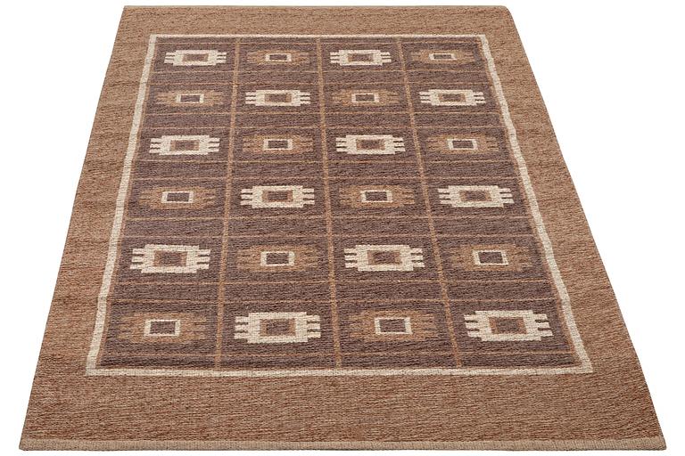 A flat weave carpet, c. 235 x 169 cm.