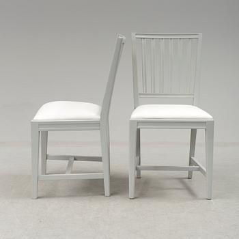 A set of eight 21st century chairs.