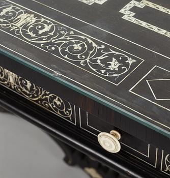 A Renaissance-style ebony, ebonized and ivory-inlaid library table, late 19th century, presumably Germany.