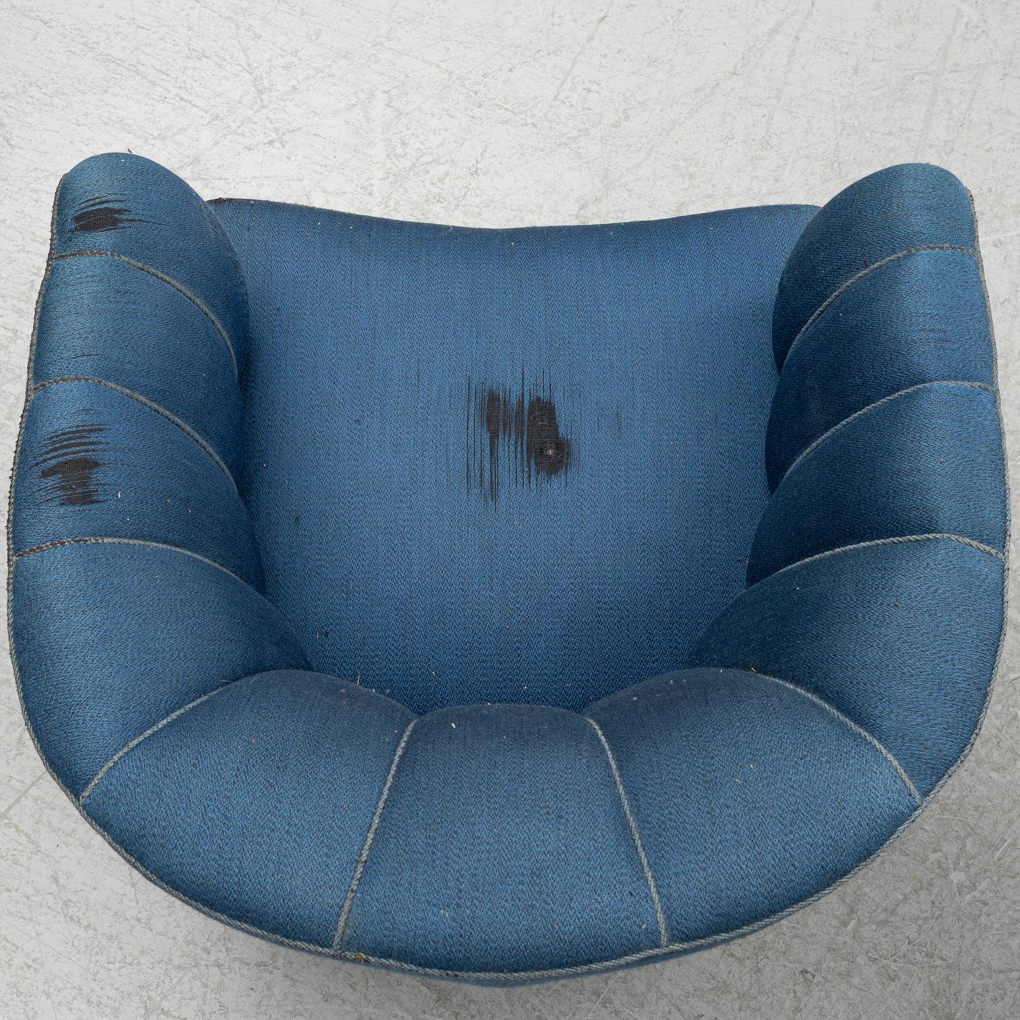 A pair of 1950's armchairs.