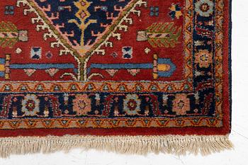 A semi-antique Kurdish runner, 350 x 140 cm.