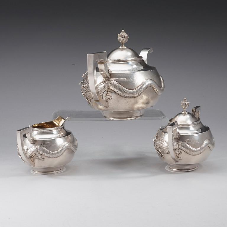 A Chinese three-piece silver tea set, unidentified master, early 20th Century.