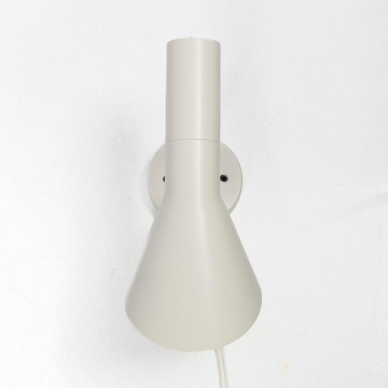 Arne Jacobsen, An 'AJ' wall lamp. Louis Poulsen, 21st century.