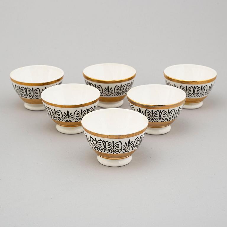 PIERO FORNASETTI, tallrikar, 4 st, samt skålar, 6 st, porslin, Milano, Italien.