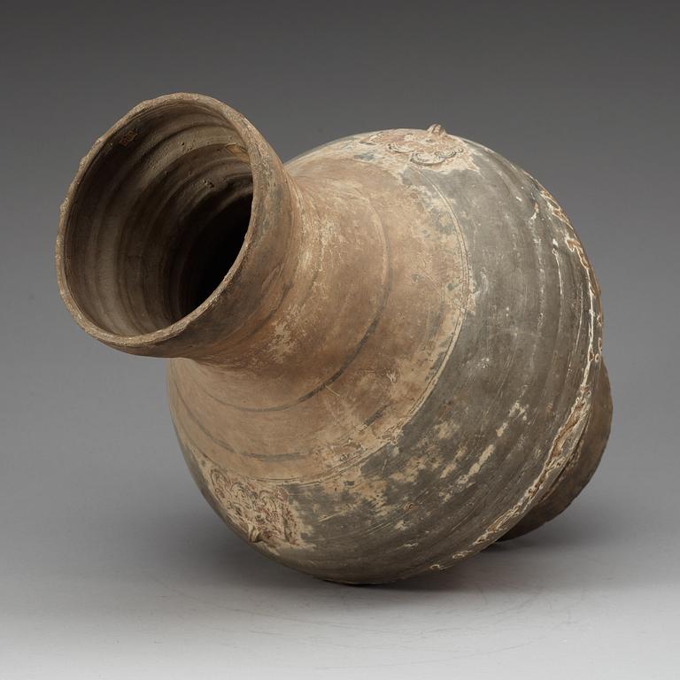 A unglazed jar, Han dynasty, (206 BC - 220 AD).