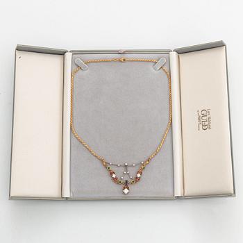 diamond, rubies, and emerald and sapphire necklace.