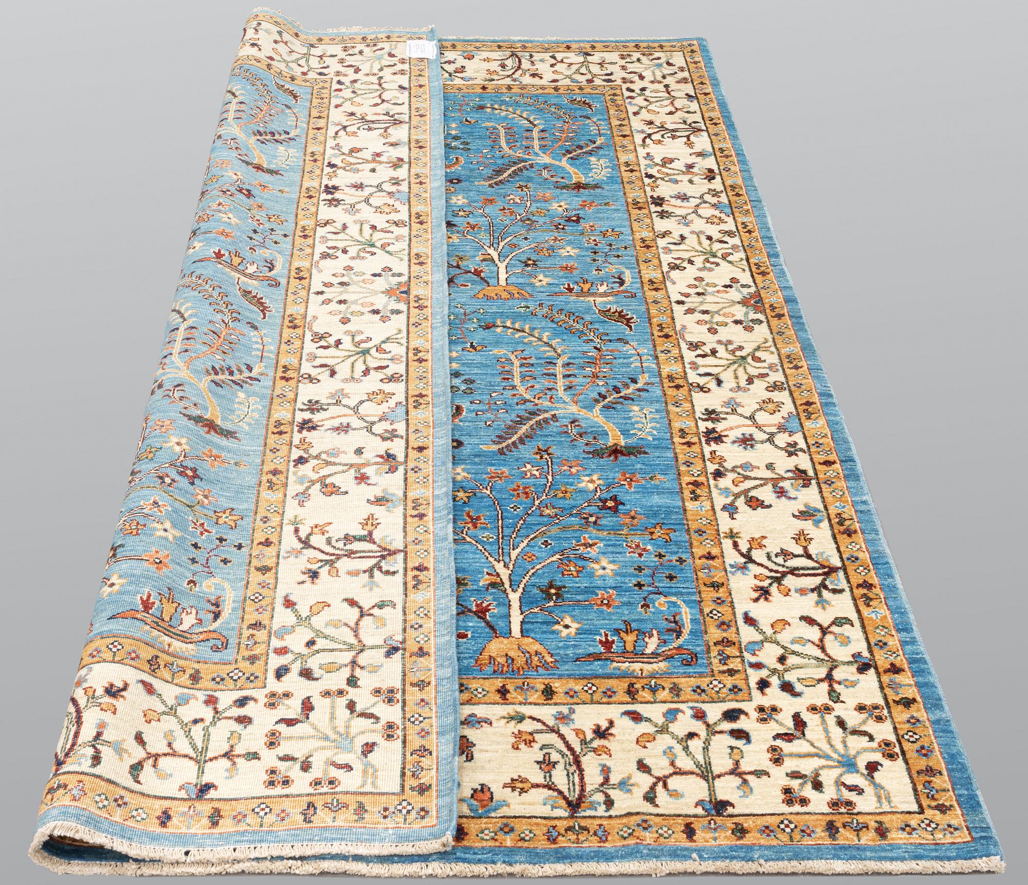 A rug, Ziegler Design, ca 239 x 164 cm.