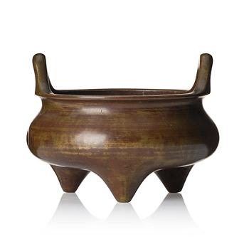 A large bronze tripod censer, Qing dynasty with Xuande six character mark.