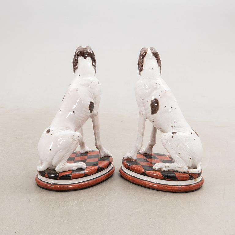 Decorative sculptures a pair England 20th century glazed ceramics.