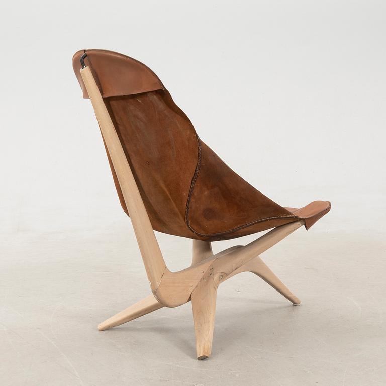 Gösta Westerbergs, a beech and leather easy chair, second half of the 20th Century.