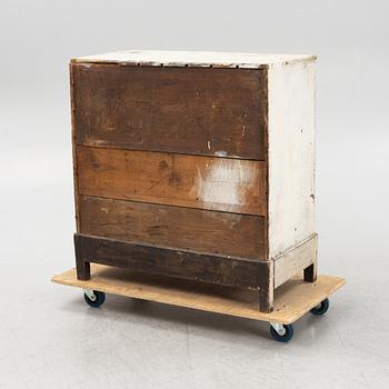 A painted chest of drawers, 20th Century.