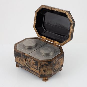 A lacquer box with pewter tea caddies, China, Qingdynasty, 19th century.