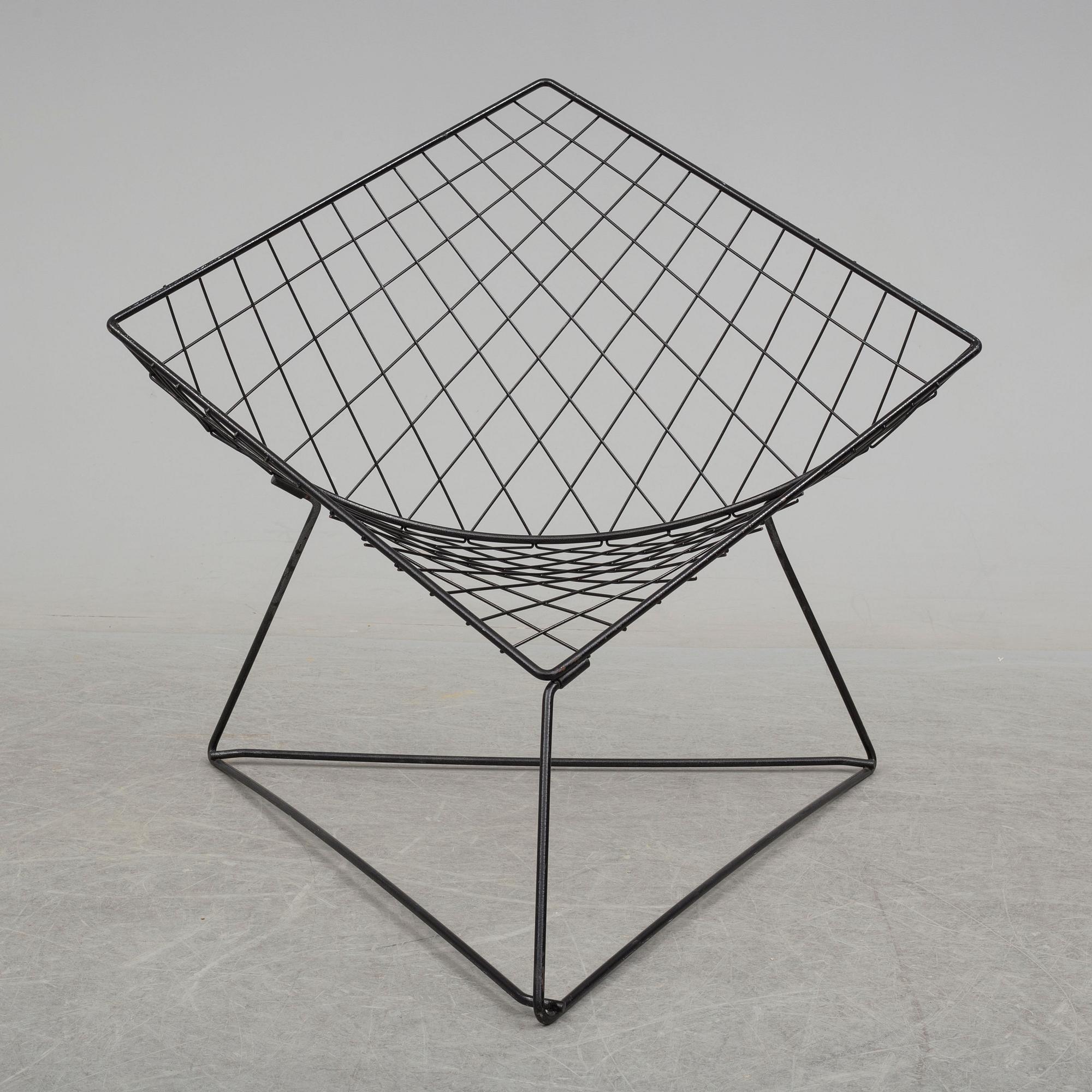 NIELS GAMMELGAARD, an 'Oti' easy chair from IKEA.