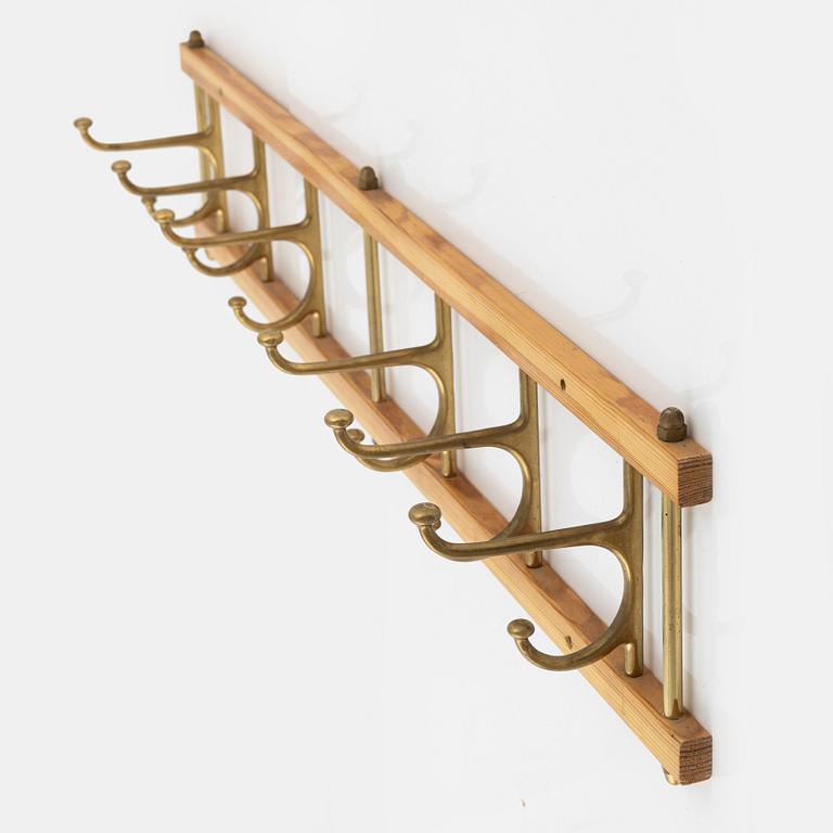 Klädhängare, "Dekorativ", Skogslunds Metallgjuteri, Anderstorp, 1950/60-tal.