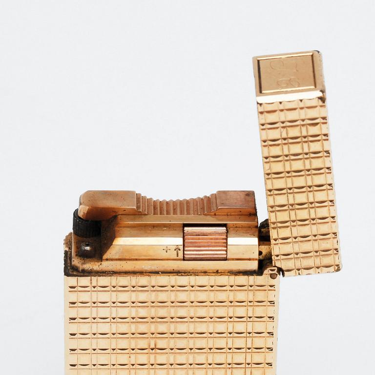 S T DUPONT, a gilded metal ligther.