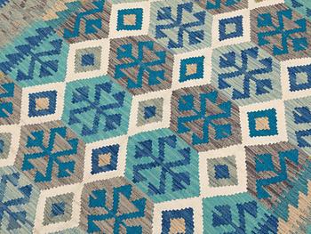 A Kilim rug, approx. 251 x 168 cm.