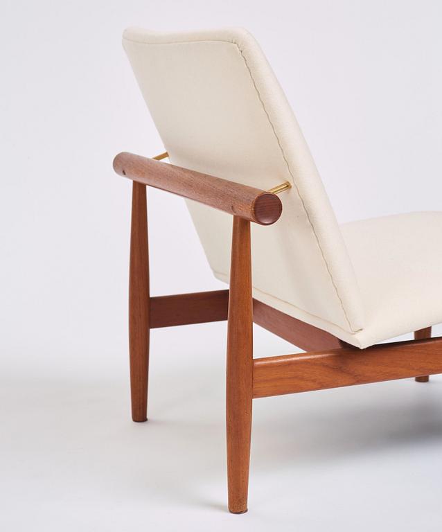 Finn Juhl, a pair of 'Japan' (FD-137) easy chairs and an ottoman, France & Son, Denmark, 1960s.