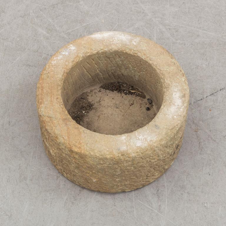 A 20th century stone flower pot.