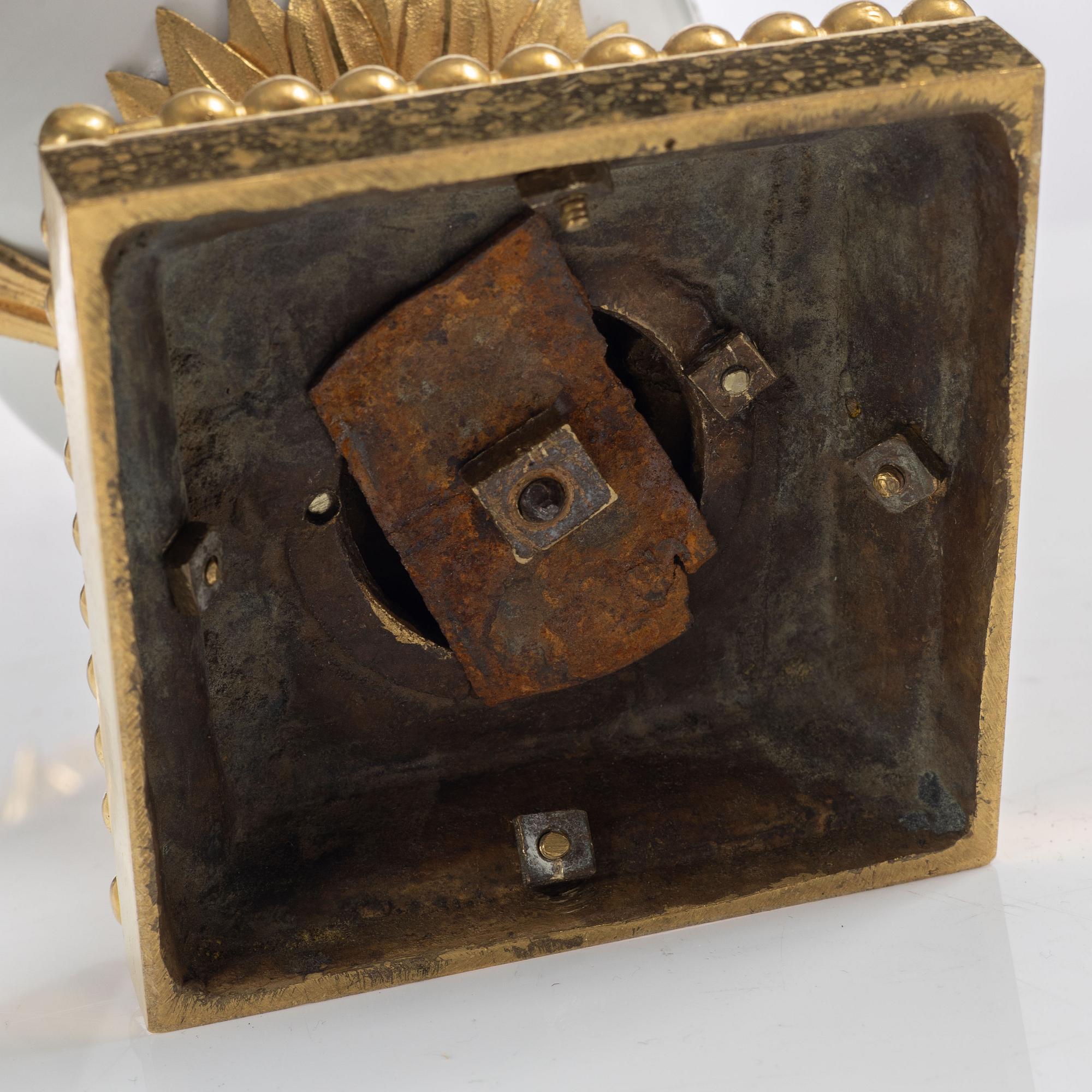 A pair of three light porcelain and gilt bronze three-branch Louis XV-style candelabra, mid 19th century.