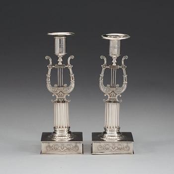 A pair of Swedish 19th century silver candlesticks, makers mark of Johan Petter Grönvall, Stockholm 1823.