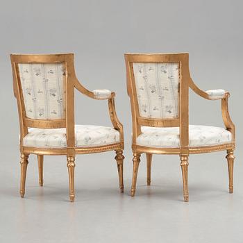 Two matched Gustavian late 18th century armchairs.