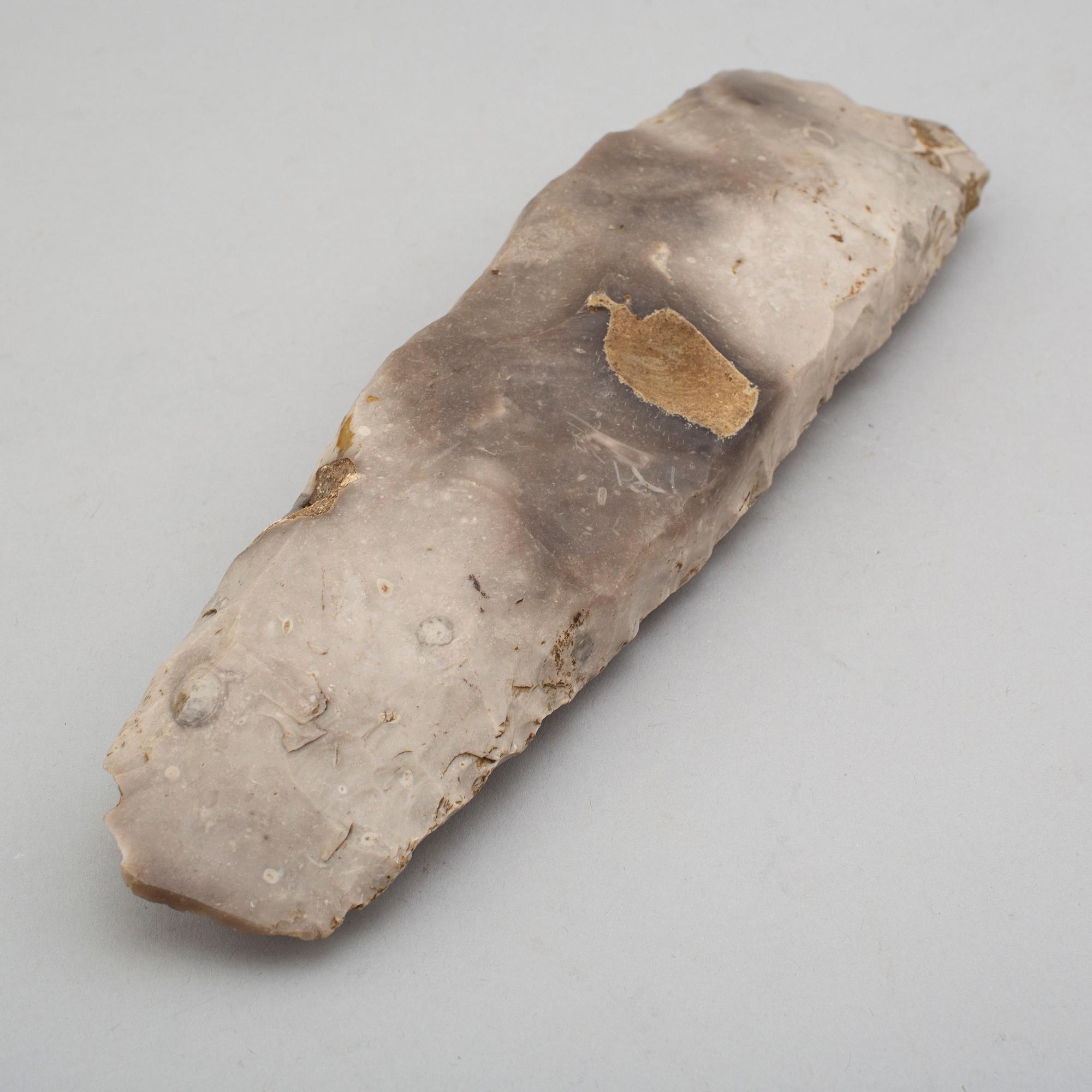 A early-mid neolithic flint axe.