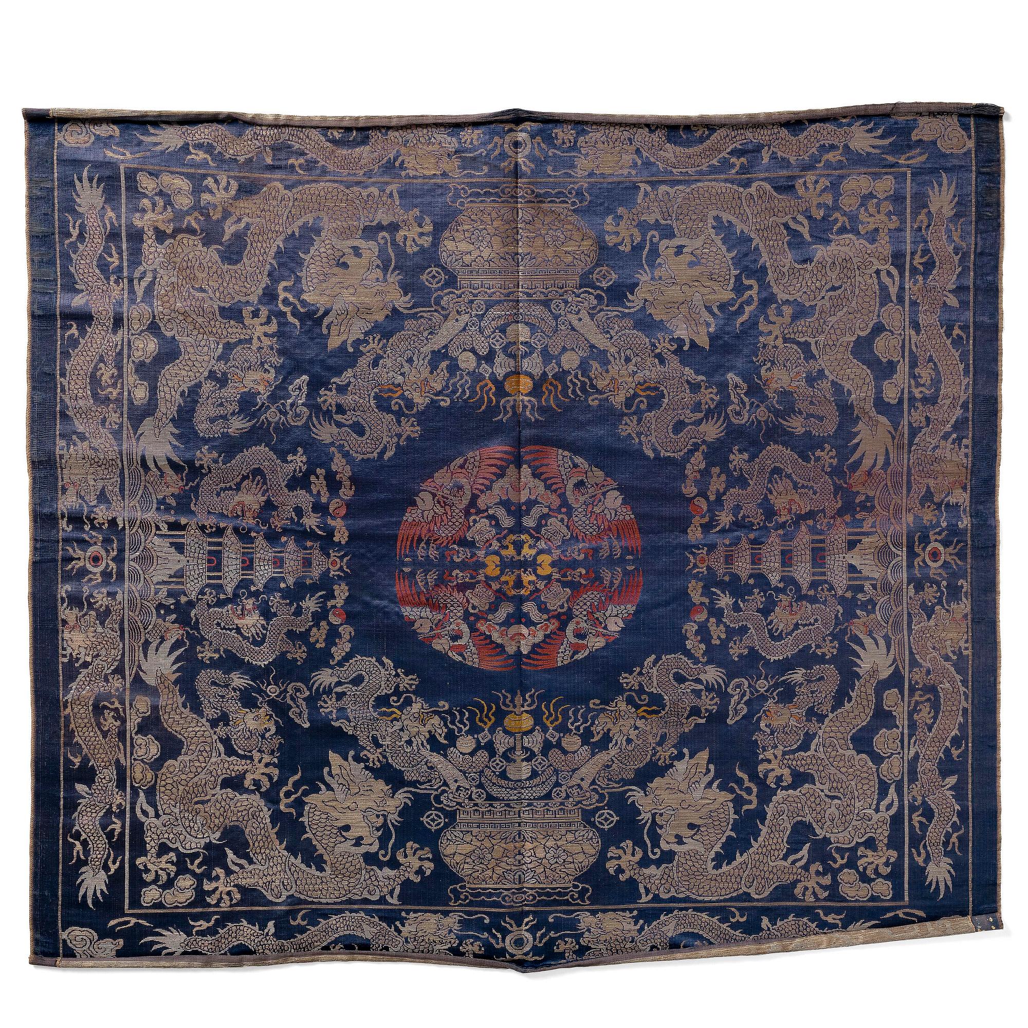 A silk blue-ground brocade panel, late Qing dynasty/early 20th century.