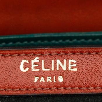CÉLINE, a dark green felt and brown leather shoulder bag.
