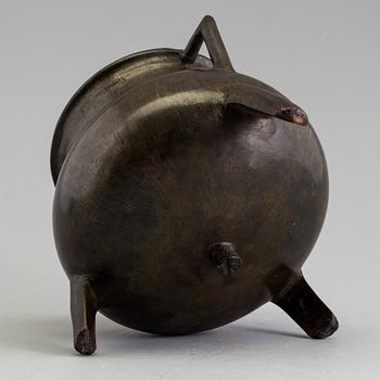 A medieval bronze pot.