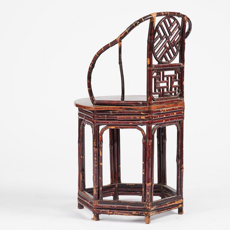 A Chinese bamboo horseshoeback armchair, late Qing dynasty.