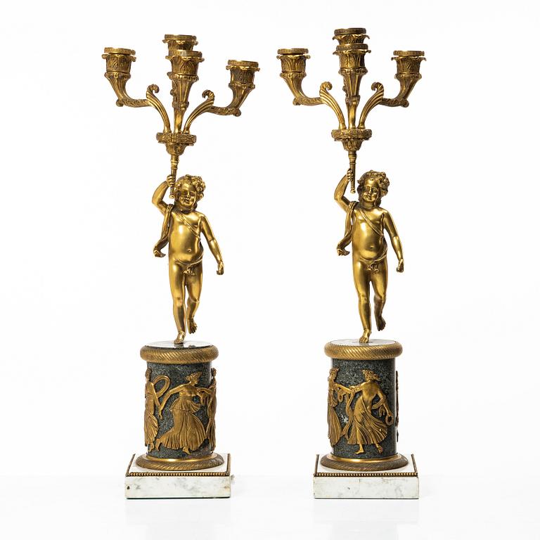 A pair of Empire style candelabra, circa 1900.