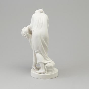 A biscuit figure of a woman and a boy, Gustafsberg, early 20th Century.