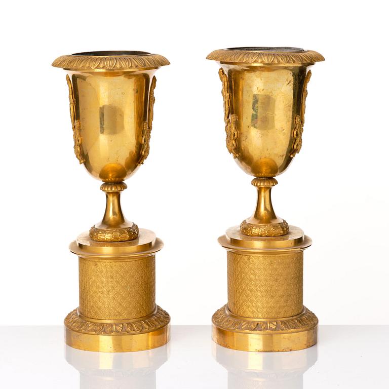 A set of three French Empire early 19th century gilt bronze centre pieces.
