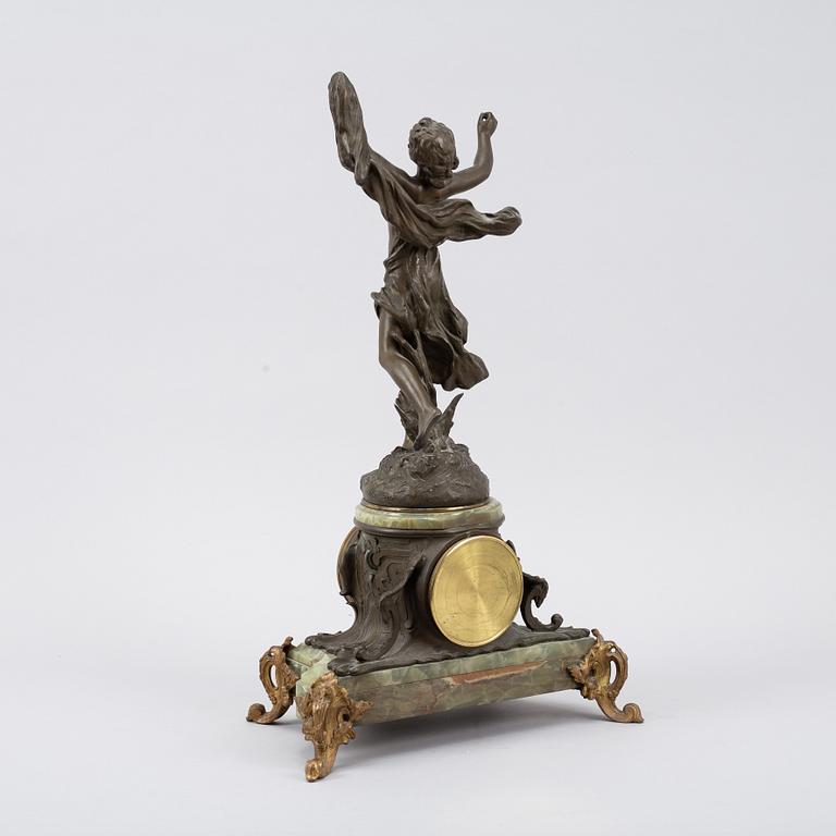 A bronze, green stone table clock, 'La Merveilleuse', after Auguste Moreau, 20th century.