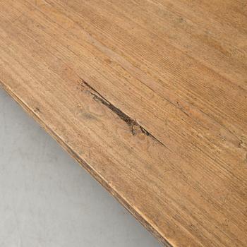 A 20th century pine table.