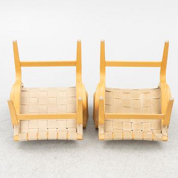 Bruno Mathsson, a pair of 'Eva' armchairs, DUX, Sweden, second half of the 20th century.