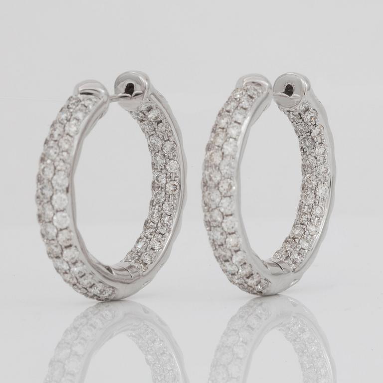 A pair of loop diamond earrings, 2.58 cts in total, according to engraving.