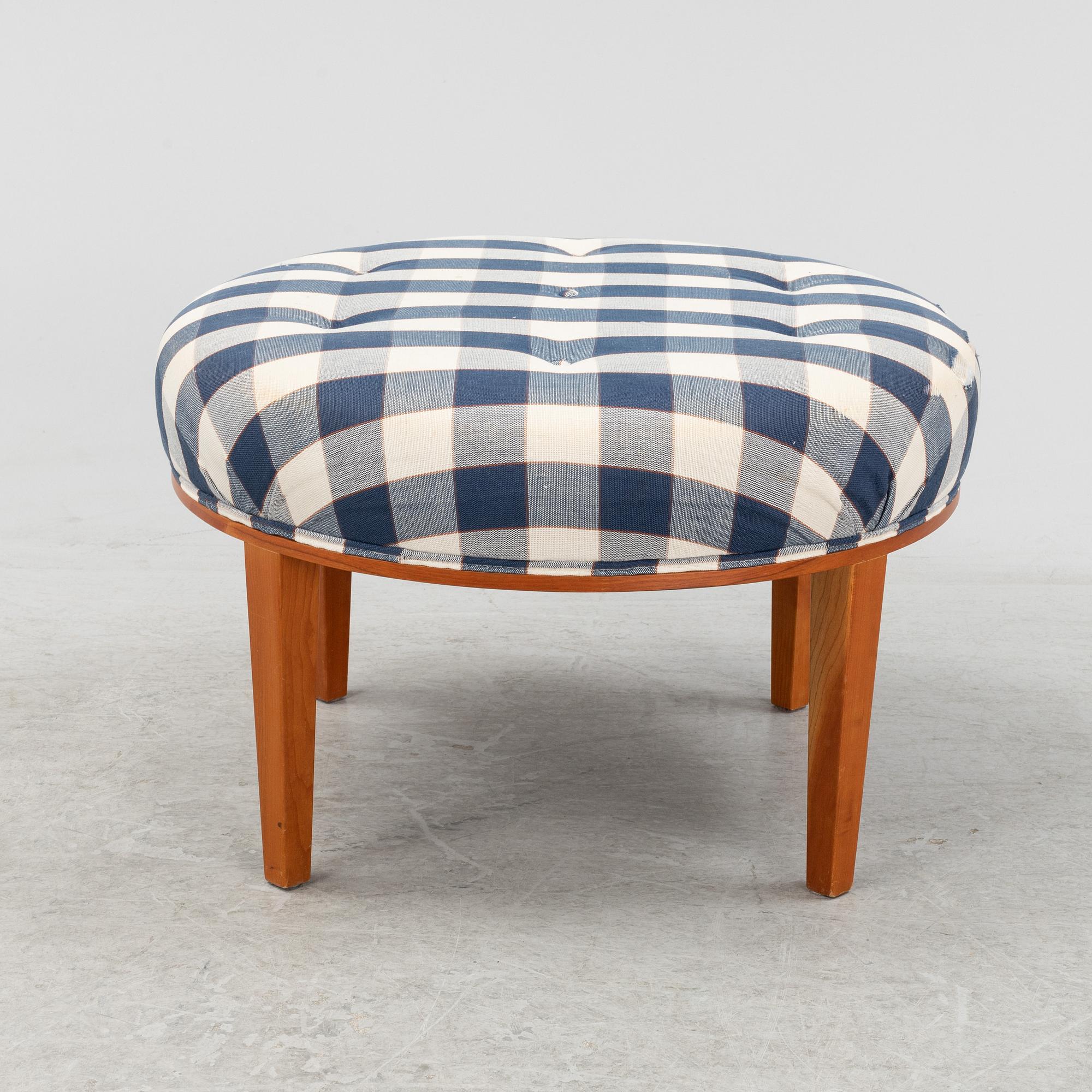 Josef Frank, a model 647 cherry wood stool by Firma Svenskt Tenn.